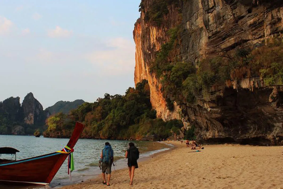 A warm beach walk scene near Tonsai and Railay at golden hour.